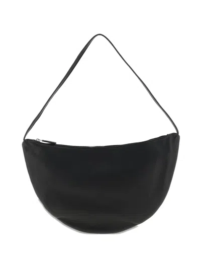 The Row Izzy Small Crescent Shoulder Bag In Leather In Black