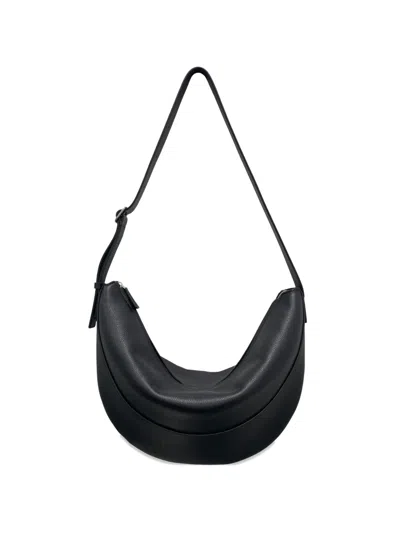 The Row Jouve Crescent Shoulder Bag In Black