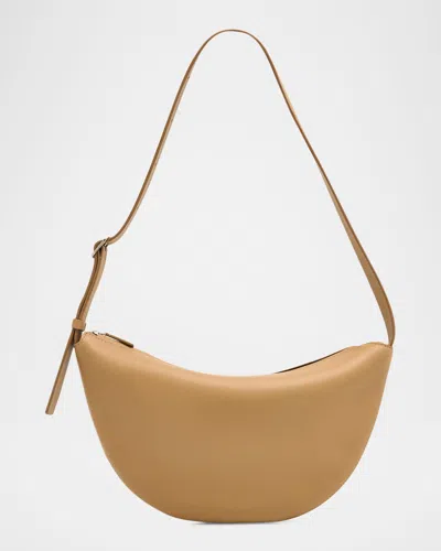 The Row Jouvette Crescent Shoulder Bag In Leather In Neutral