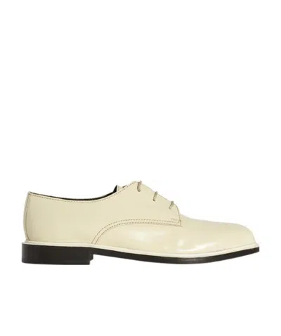 The Row Jules Lace-up Derby Shoes In Nude
