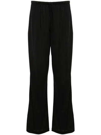 The Row Lanuit Trousers In Black