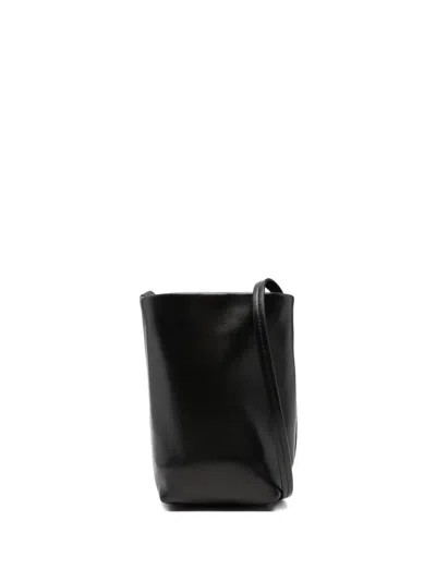 The Row Leather Cross Body Bag In Black