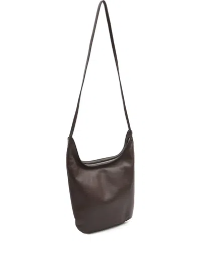 The Row Leather Crossbody Bag In Brown
