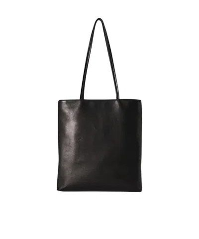 The Row Leather Flat Shoulder Bag In Black