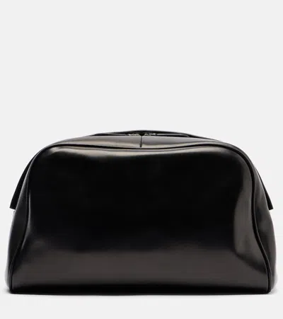 The Row Leila Small Leather Clutch In Black