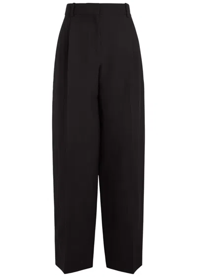 The Row Lilas Wool-blend Trousers In Black