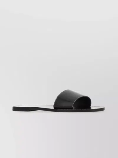 The Row Link Leather Slides Flat Sole In Black