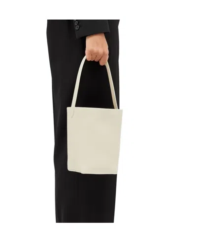 The Row Logo Handbag In Black