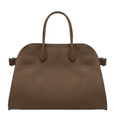 The Row Logo Handbag In Brown