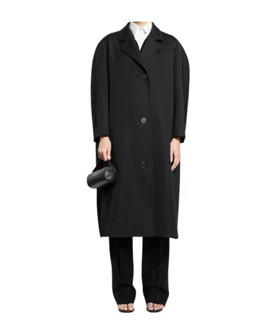 The Row Long-sleeved Coat In Black