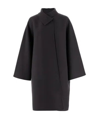 The Row Long-sleeved Coat In Black