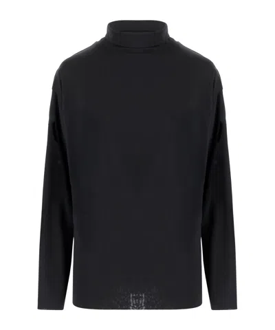 The Row Long-sleeved Knitwear In Black