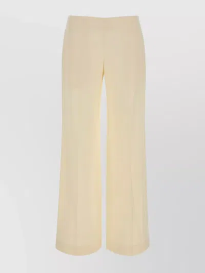 THE ROW LONG WIDE LEG TROUSERS