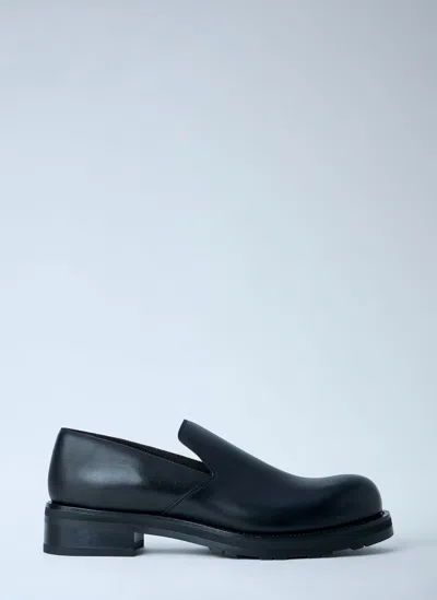 The Row Lug Sole Slip On Shoes In Black