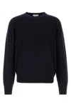 The Row Dark Navy Solid Sweater In Blue
