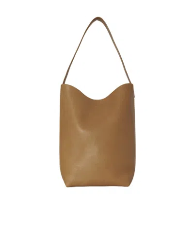 The Row Medium Logo Handbag In Brown