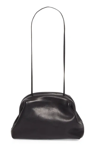 The Row Mira Clutch Bag In Saddle Leather In Black