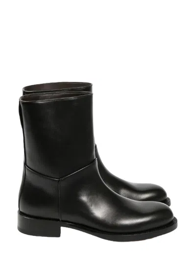 The Row Nobilis Boots In Black