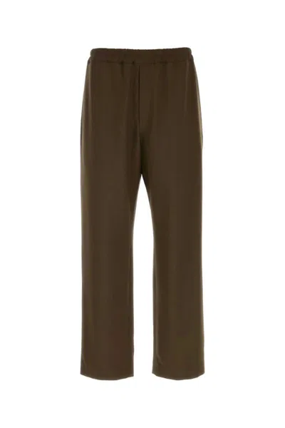 The Row Pants In Brown