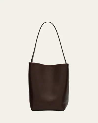 The Row Park Medium North-south Tote Bag In Saddle Leather In Brown