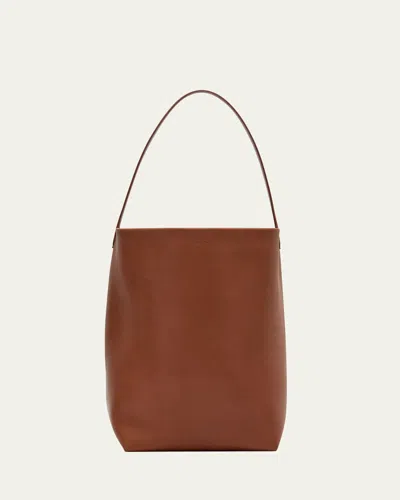The Row Park North-south Tote Bag In Leather In Dark Cuir