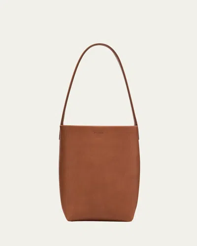 The Row Park Small North-south Tote Bag In Saddle Leather In Dcu Dark Cuir