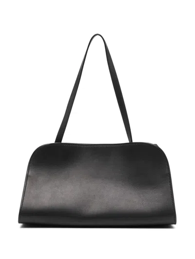 The Row Peggy Clutch Bag In Black
