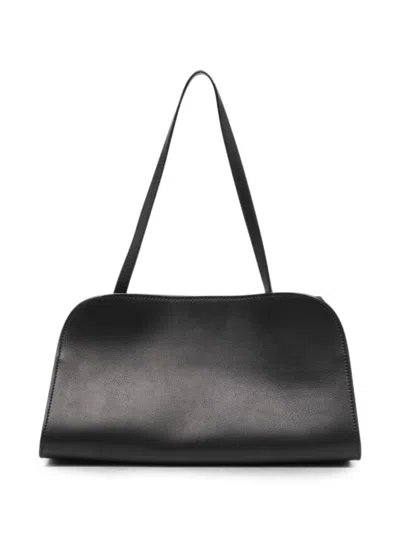 The Row Peggy Clutch In Black