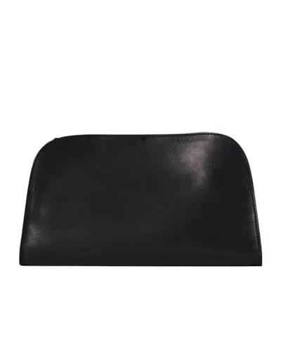 The Row Peggy Clutch In Leather In Black