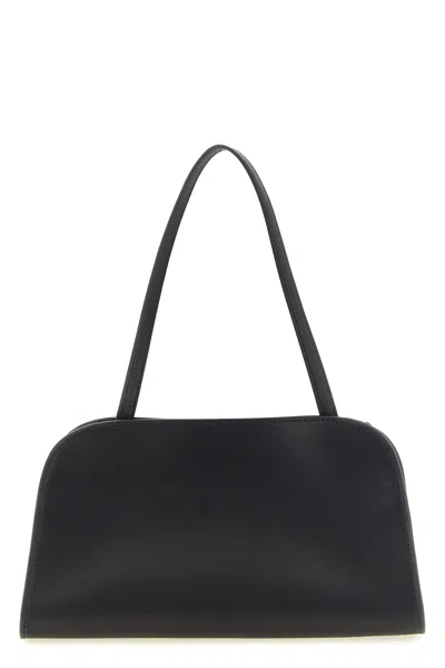 The Row 'peggy' Clutch In Schwarz