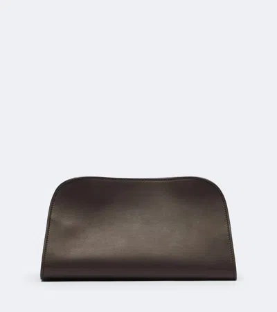 The Row Peggy Leather Clutch In Brown