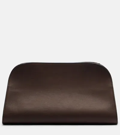 The Row Peggy Small Leather Clutch In Brown