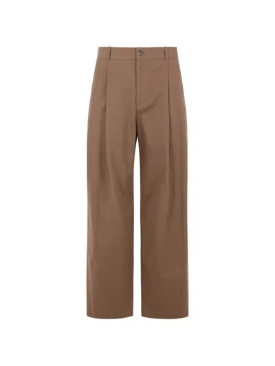 The Row Pleated Mid-rise Trousers In Brown