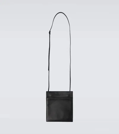 The Row Pocket Leather Crossbody Bag In Black Shg