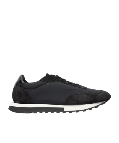 The Row Round-head Sneakers In Black