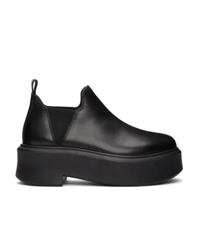 The Row Slip-on Boots In Black