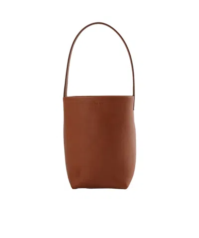 The Row Small Lasso Handbag In Brown
