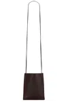 The Row Small To Go Crossbody Bag In Brown