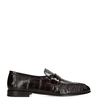The Row Soft Fish Skin Loafers In Brown