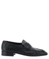 The Row Crinkled Glossed-leather Loafers In Black