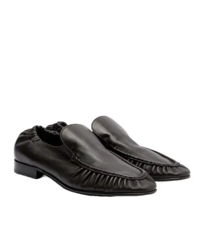 The Row Soft Ruched Leather Loafers In Black