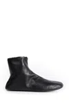 The Row Stella Boots In Leather And Shearling In Black