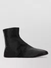 The Row Leather Ankle Boots Lined With Soft Shearling In Black