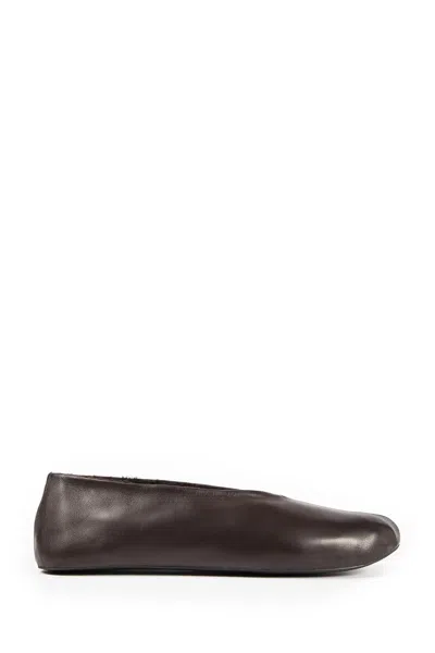 The Row Stella Slippers In Leather And Shearling In Brown
