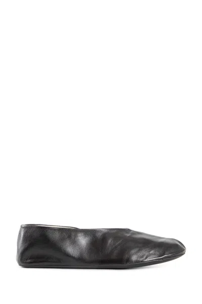 The Row Stella Slippers In Leather In Black
