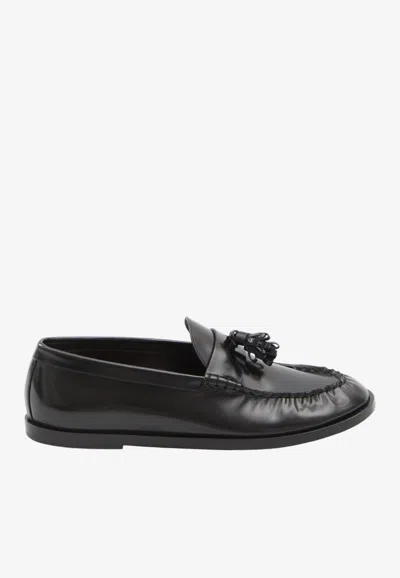 The Row Tassel Leather Loafers In Black