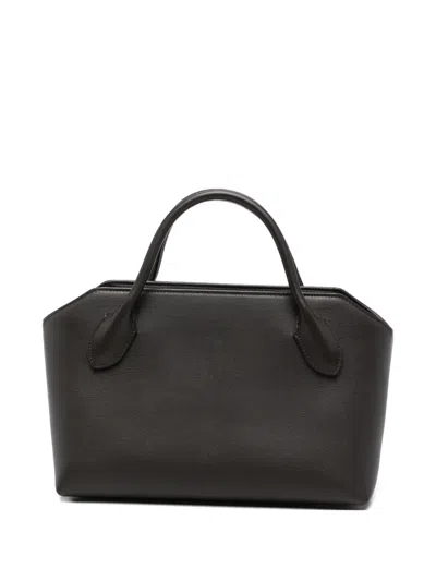 The Row Terrasse Hammered Leather Top Handle Bag In Black