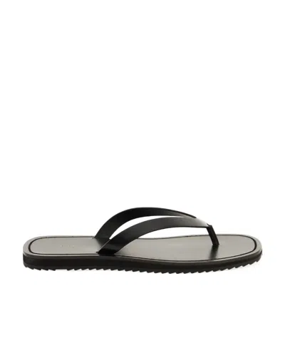 THE ROW THONG-STRAP LEATHER FLIP FLOPS