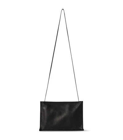 The Row To Go Large Leather Cross-body Bag In Black