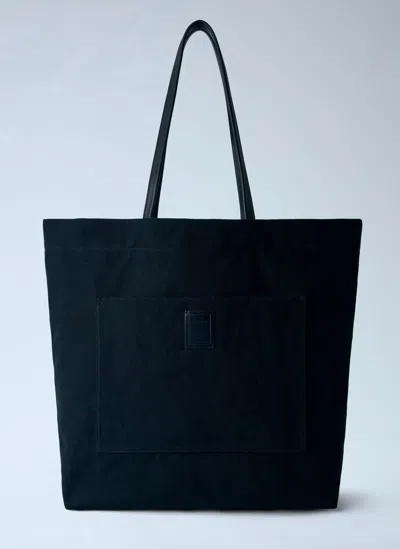 The Row Tori Leather-trimmed Canvas Tote Bag In Black